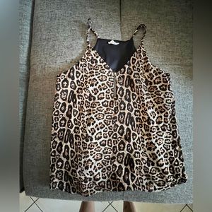 Leopard racerback flowy top with zippered front size large.